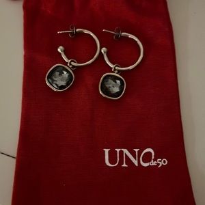Uno de 50 earrings.